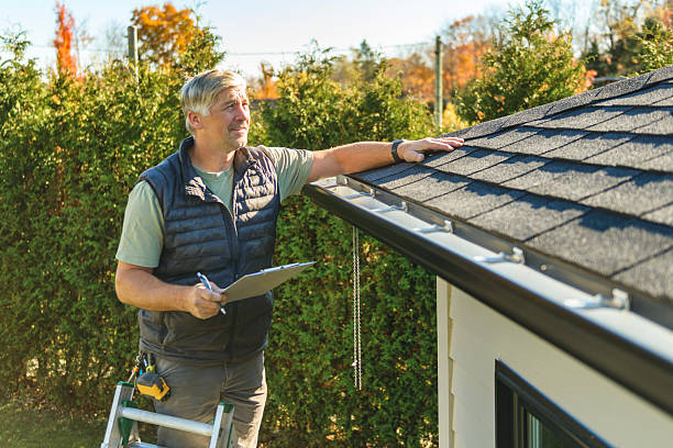 Professional Roof Replacement technician working in Bolton, MA